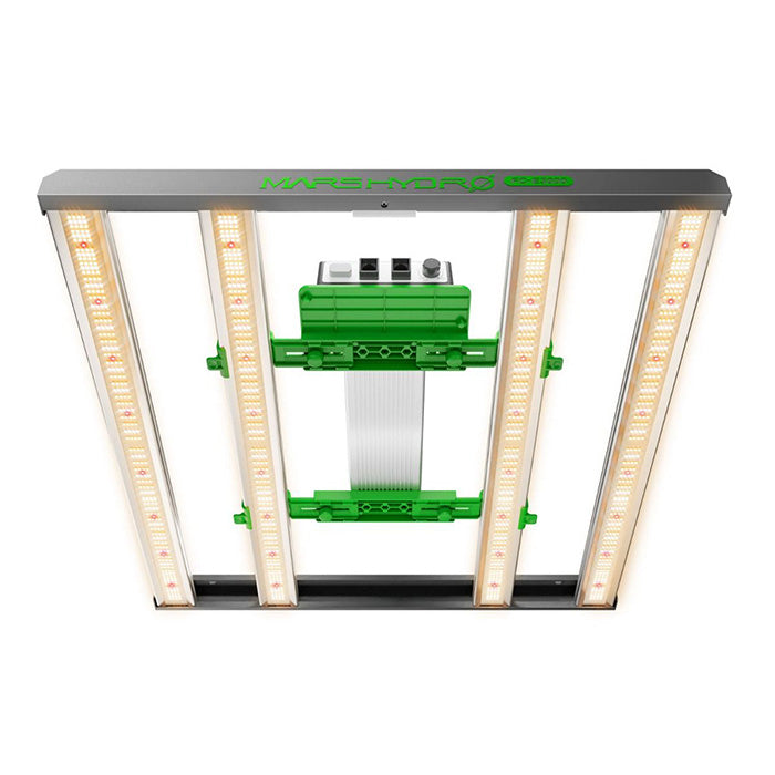 Mars Hydro FC-E3000 300 Watt LED Grow Light illuminating a plant undergrowth